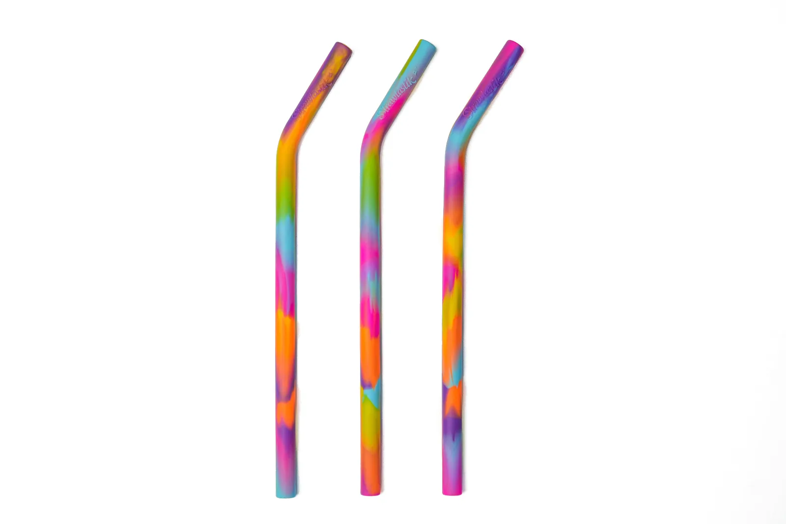 Three rainbow Strawtastik straws side by side, each swirled with a different mix of colors